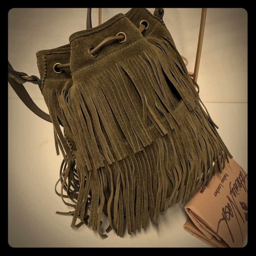 New Fringe bucket bag in suede leather.